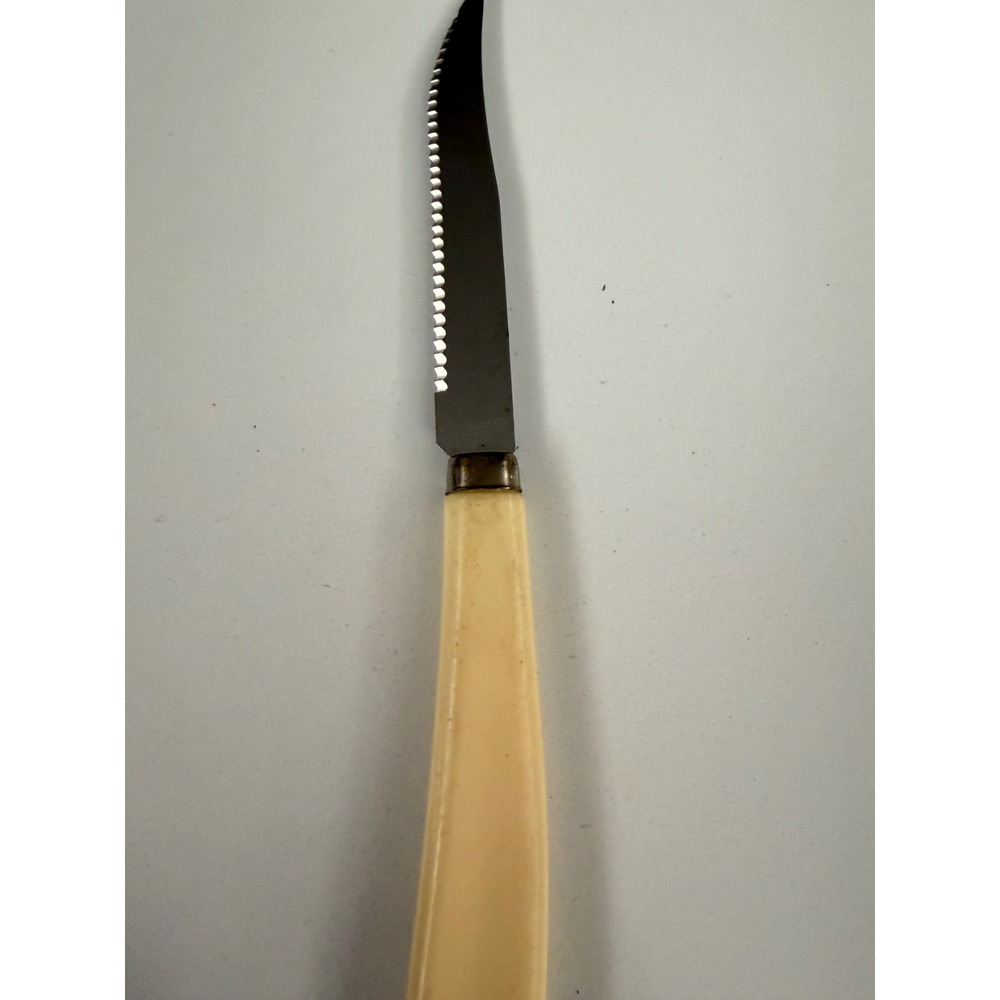 Vintage Quikut Stainless Steel Serrated Steak Knife USA Cream Handle Cutlery